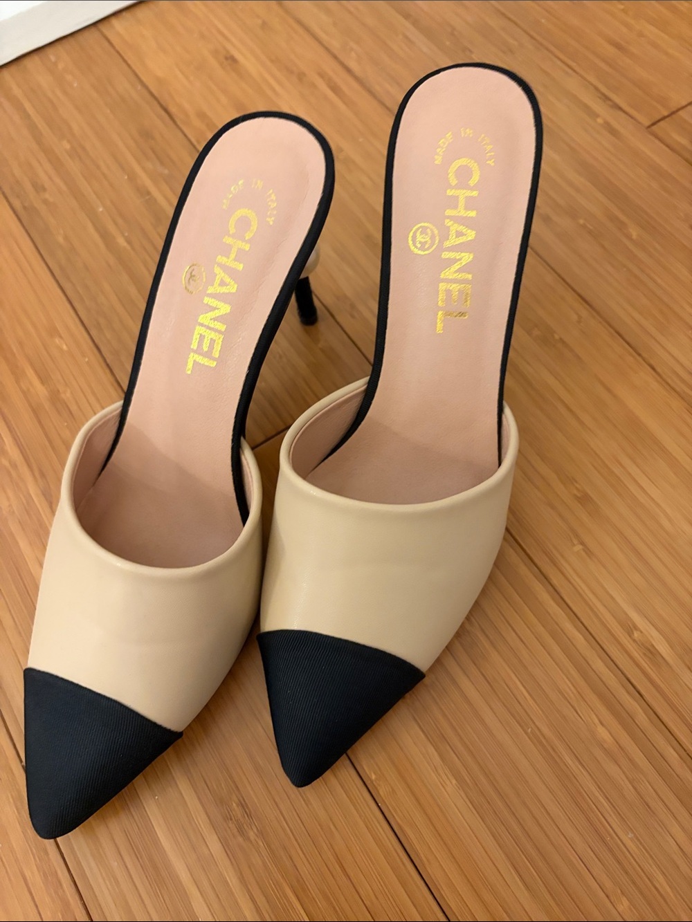 CHANEL Cream and Black Pointed Toe Slip-On Mules